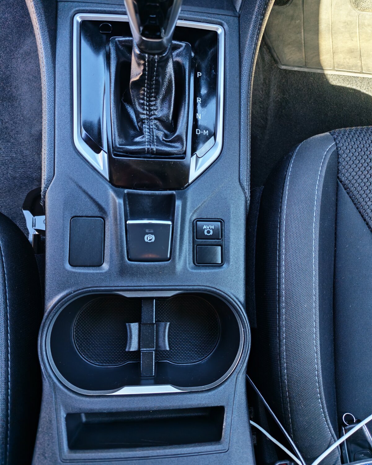 The same centre console and cup holders after cleaning